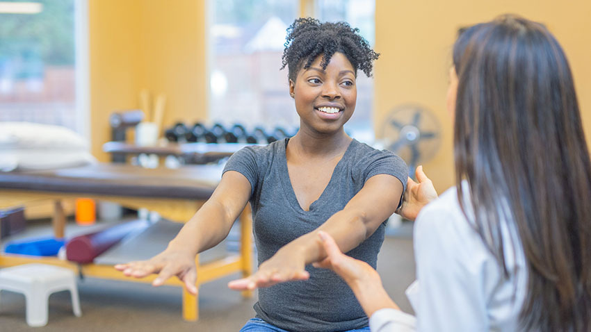 https://www.rogelcancercenter.org/images/woman-stretching-arms-physical-therapy.jpg